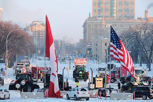 MIKE DEAL / WINNIPEG FREE PRESS
Protesters block the entrance to the Manitoba Legislative building on Broadway Avenue and have parked their trucks along Memorial early Friday morning.
220204 - Friday, February 04, 2022.