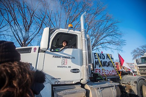 MIKAELA MACKENZIE / WINNIPEG FREE PRESS

Trucker Adam Harris participates in a rally against vaccine mandates outside of the Manitoba Legislative Building in Winnipeg on Friday, Feb. 4, 2022. For Carol/Danielle story.
Winnipeg Free Press 2022.