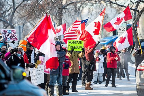 MIKAELA MACKENZIE / WINNIPEG FREE PRESS

Folks rally against vaccine mandates and in support of truckers outside of the Manitoba Legislative Building in Winnipeg on Friday, Feb. 4, 2022. For Carol/Danielle story.
Winnipeg Free Press 2022.