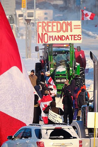 MIKE DEAL / WINNIPEG FREE PRESS
Protesters block the entrance to the Manitoba Legislative building on Broadway Avenue and have parked their trucks along Memorial early Friday morning.
220204 - Friday, February 04, 2022.