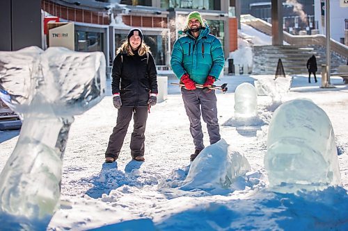 MIKAELA MACKENZIE / WINNIPEG FREE PRESS

Pamela Hardman with the Downtown BIZ and sculptor Peter Hargraves pose for a portrait by an ice sculpture of belugas at True North Square in Winnipeg on Friday, Feb. 4, 2022. For Kevin story.
Winnipeg Free Press 2022.