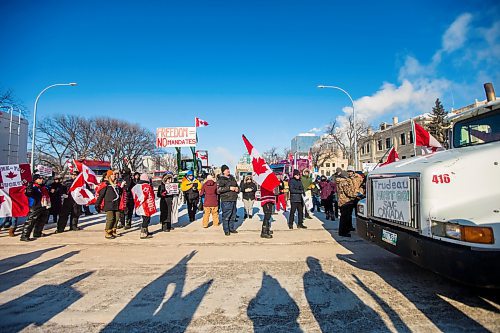 MIKAELA MACKENZIE / WINNIPEG FREE PRESS

Folks rally against vaccine mandates and in support of truckers outside of the Manitoba Legislative Building in Winnipeg on Friday, Feb. 4, 2022. For Carol/Danielle story.
Winnipeg Free Press 2022.