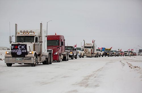 Ralliers participate in a slow-role truck convoy fr freedom in Brandon Saturday. The protest was in support of truckers in Ottawa pushing for the end of COVID-19 related mandates. The group of several dozen vehicles, including semis, departed from the north hill Tim Hortons and ended at the Victoria Inn parking lot &#x2014; it was originally scheduled to drive down to Portage la Prairie but was re-rooted due to poor road conditions. (Chelsea Kemp/The Brandon Sun)