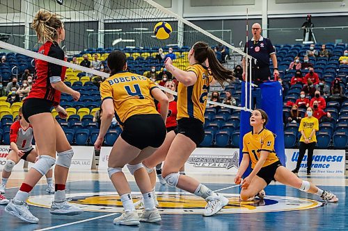 Brandon University Bobcats Revyn Wiebe, left, Kaoane Loch and Jamie Bain defend the net against the University of Winnipeg Wesmen in a Canada West women&#x573; volleyball game at the Healthy Living Centre Saturday. (Chelsea Kemp/The Brandon Sun)