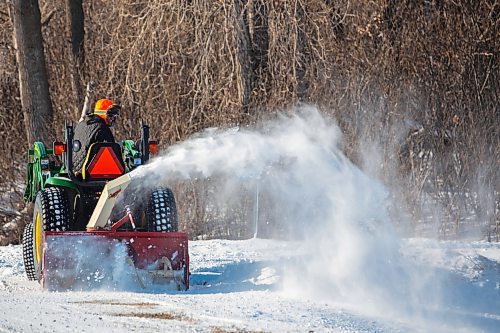 A man plows his driveway Thursday in Douglas. (Chelsea Kemp/The Brandon Sun)