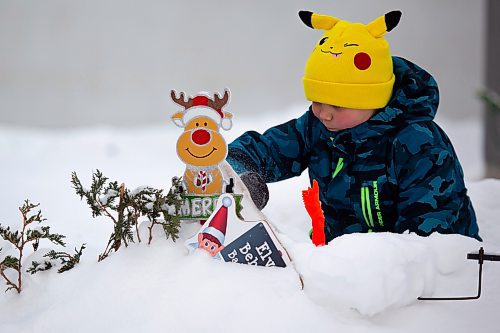 Sylas Arnold, 9, plays in a fort he built with his friends Saturday. (Chelsea Kemp/The Brandon Sun)