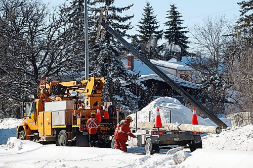 JOHN WOODS / WINNIPEG FREE PRESS
A hydro crew works on repairing a pole that was hit by a vehicle on Rte. 90 just south of Academy Road, Sunday, February 6, 2022. 

Re: Piche