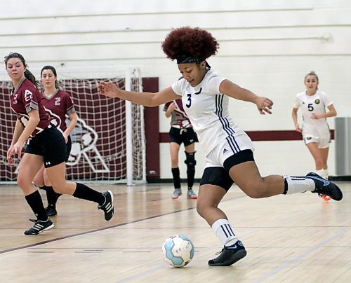 Brandon University Bobcats Kira Ireson dribbles against the Assiniboine Community College Cougars during their Manitoba Colleges Athletic Conference women's futsal game at ACC on Sunday. (Thomas Friesen/The Brandon Sun)