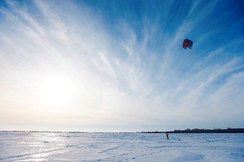 MIKAELA MACKENZIE / WINNIPEG FREE PRESS

Carlo Abubo enjoys the warm, windy weather while kiteboarding at Beaudry Provincial Park just outside of Winnipeg on Monday, Feb. 7, 2022. Entry to provincial parks is free all of February. Standup.
Winnipeg Free Press 2022.