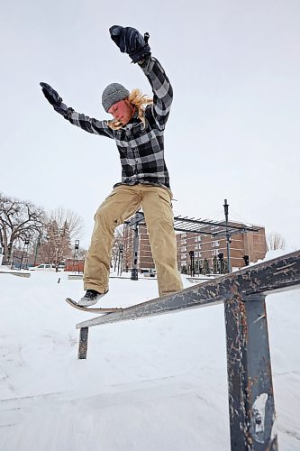07022021
Tanner Kitson of Rapid City frontside board-slides a rail at the Kristopher Campbell Memorial Skatepark in Brandon while snow-skating with his brother Quintin on a mild Monday. (Tim Smith/The Brandon Sun)