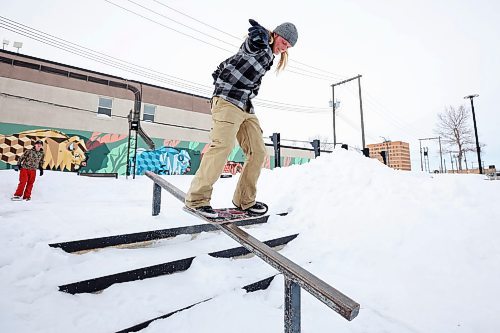 07022021
Tanner Kitson of Rapid City board-slides a rail at the Kristopher Campbell Memorial Skatepark in Brandon while snow-skating with his brother Quintin on a mild Monday. (Tim Smith/The Brandon Sun)