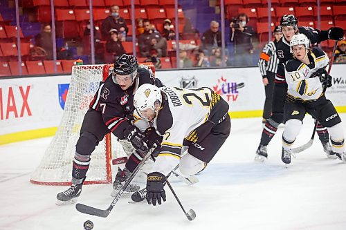 08022022
Landon Roberts #22 of the Brandon Wheat Kings collides with Kyle Masters #7 of the Red Deer Rebels while chasing the puck during WHL action at Westoba Place on Tuesday evening. (Tim Smith/The Brandon Sun)