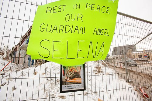 MIKE DEAL / WINNIPEG FREE PRESS
A memorial has been set up for Selena the West End BIZ office cat who died in the fire.
The destroyed store fronts of the Kirkwood Block at Portage Avenue and Langside Street.
Fire ripped through the structure at the beginning of February. 
See Ben Waldman story
220209 - Wednesday, February 09, 2022.