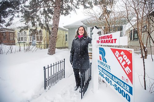 MIKAELA MACKENZIE / WINNIPEG FREE PRESS

Ren&#xe9;e Robidoux Kapitoler, real estate agent, poses for a portrait in front of a house that will be coming on the market soon in Winnipeg on Thursday, Feb. 10, 2022. She&#x2019;s never seen the housing market as crazy in January/February than this year (and maybe last). For Gabby Piche story.
Winnipeg Free Press 2022.