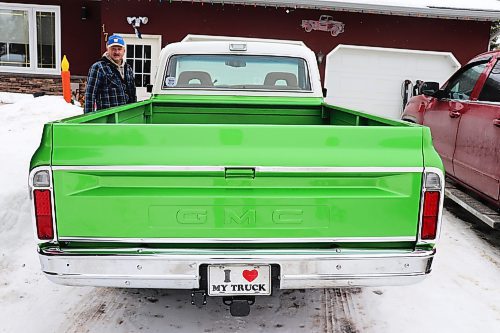 Gary Miller shows off the bed of his 1972 GMC truck on Wednesday afternoon outside his home in Brandon. (Kyle Darbyson/The Brandon Sun)