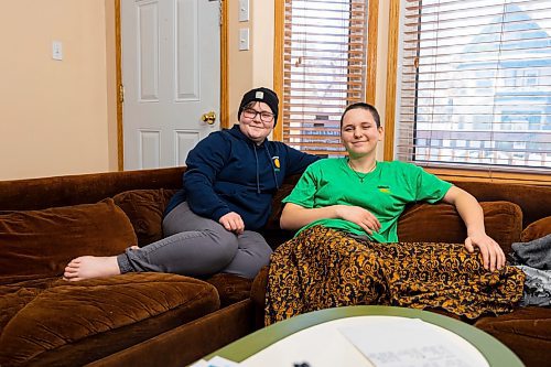 Katimavik participants Meaghan Foster, left, and Hannah Lyon sit in the living room of their program&#x573; house Friday. (Chelsea Kemp/The Brandon Sun)