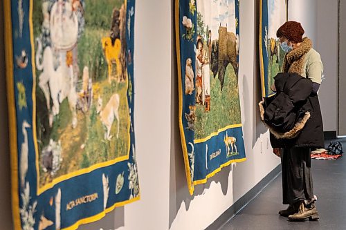 Guests explore the Art Gallery of Southwest Manitoba Thursday during the opening of artist Mary Anne Barkhouseճ exhibit opimihaw. (Chelsea Kemp/The Brandon Sun)