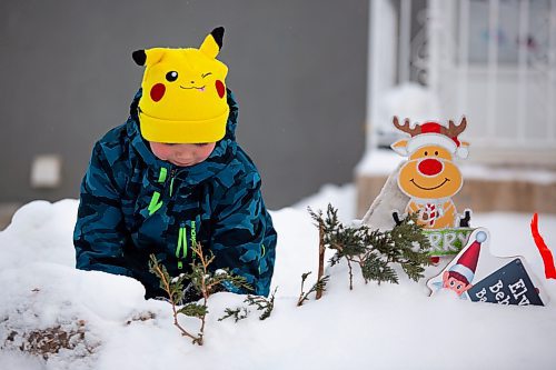 Sylas Arnold, 9, plays in a fort he built with his friends Saturday. (Chelsea Kemp/The Brandon Sun)