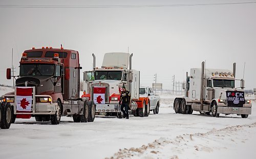 Ralliers participate in a slow-roll truck convoy for freedom in Brandon Saturday. The protest was in support of truckers in Ottawa pushing for the end of COVID-19 related mandates. The group of several dozen vehicles, including semis, departed from the north hill Tim Hortons and ended at the Victoria Inn parking lot &#x2014; it was originally scheduled to drive down to Portage la Prairie but was re-rooted due to poor road conditions. (Chelsea Kemp/The Brandon Sun)