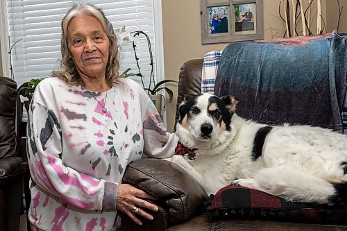 Marlene Blake and her emotional support dog Kassie sit in their living room Saturday. (Chelsea Kemp/The Brandon Sun)