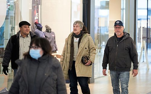 David Lipnowski / Winnipeg Free Press

Protesters walk around CF Polo Park Mall without required face masks Saturday February 12, 2022.