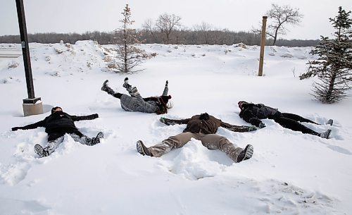 JESSICA LEE / WINNIPEG FREE PRESS

From left to right: Insurance brokers Chelsea Scheer-Kosowan, Rosealie Van Deynze, Vincent Kluz and Suzanne Percival take a break from work and make snow angels on February 14, 2022. Starting today until March 14, CancerCare Manitoba Foundation is asking Manitobans to cover the province in snow angels in memory of their loved ones.








