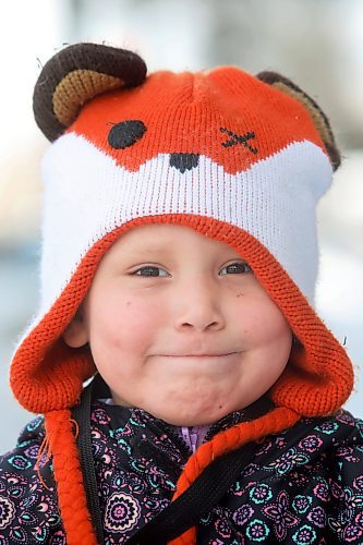 14022021
Jade Baker, five, smiles while walking downtown with her dad on Monday. (Tim Smith/The Brandon Sun)