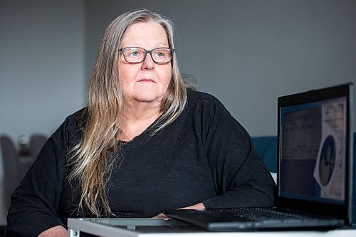 MIKAELA MACKENZIE / WINNIPEG FREE PRESS

Dr. Anne Lindsay, who does archival research in support of locating burial sites of missing Indigenous patients who never returned from Manitoba Tuberculosis Hospitals, poses for a portrait in her home in Winnipeg on Tuesday, Feb. 15, 2022. For Cody Sellar story.
Winnipeg Free Press 2022.