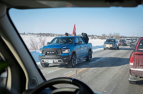 JESSICA LEE / WINNIPEG FREE PRESS

A funeral procession of cars is photographed at Cross Lake on February 16, 2022.

Reporter: Danielle
