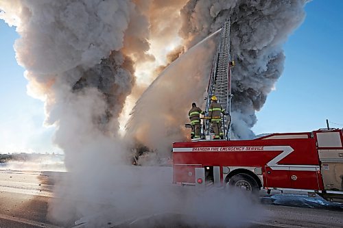 17022022
Brandon Fire and Emergency Services members battle a large fire that destroyed an apartment complex under construction on Victoria Avenue and 42nd Street in Brandon on a bitterly cold Thursday morning. (Tim Smith/The Brandon Sun)