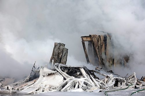 17022022
Firefighters continued to douse hot spots at an under-construction apartment complex on Victoria Avenue at 42nd St. late Thursday afternoon after the build burned to the ground Thursday morning. (Tim Smith/The Brandon Sun)