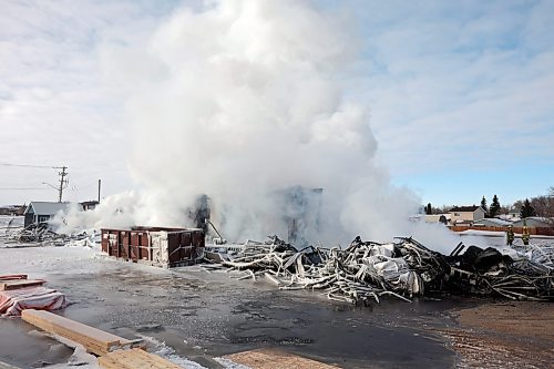 17022022
Firefighters continued to douse hot spots at an under-construction apartment complex on Victoria Avenue at 42nd St. late Thursday afternoon after the build burned to the ground Thursday morning. (Tim Smith/The Brandon Sun)