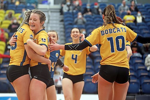 17022022
Brandon University Bobcats players celebrate a point during university women's volleyball action against the University of Winnipeg Wesmen at the BU Healthy Living Centre on Thursday evening.  (Tim Smith/The Brandon Sun)