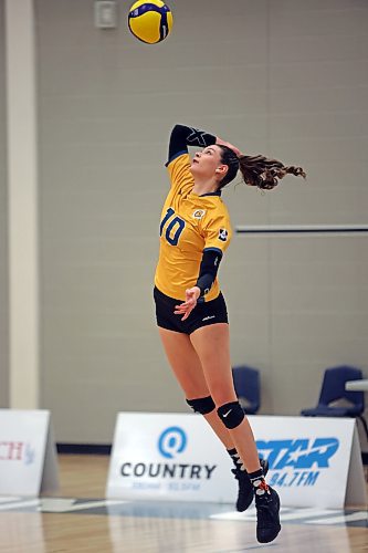 17022022
Keely Anderson #10 of the Brandon University Bobcats serves the ball during university women's volleyball action against the University of Winnipeg Wesmen at the BU Healthy Living Centre on Thursday evening.  (Tim Smith/The Brandon Sun)