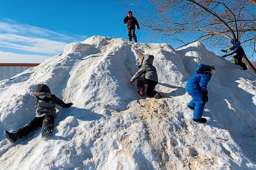 Youth play on a snow pile during Winter Fest at the Sportsplex Saturday. (Chelsea Kemp/The Brandon Sun)