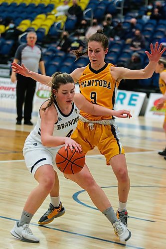 Brandon University Bobcats Sydney Latrace blocks University of Manitoba Bisons Autumn Agar in a Canada West women&#x573; basketball game at the Healthy Living Centre Friday. (Chelsea Kemp/The Brandon Sun)