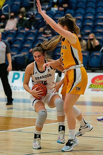 Brandon University Bobcats Adrianna Proulx defends the ball from the University of Manitoba Bisons Emerson Martin in a Canada West women&#x573; basketball game at the Healthy Living Centre Friday. (Chelsea Kemp/The Brandon Sun)