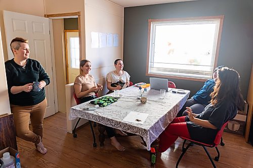 Katimavik participants sit at the kitchen table in their house Friday. (Chelsea Kemp/The Brandon Sun)