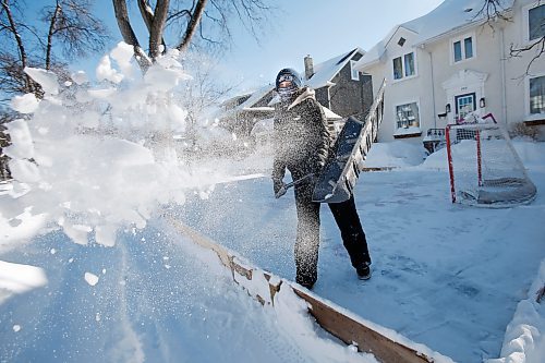 JOHN WOODS / WINNIPEG FREE PRESS
Maeve Hemmerling clears snow from the neighbourhood rink in Crescentwood, Sunday, February 20, 2022. Winnipeg and surrounding area received another dump of snow yesterday.

Re: ?