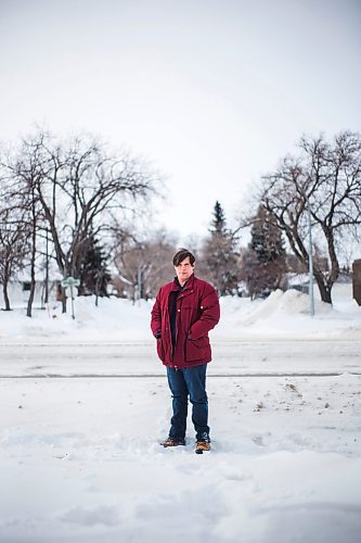 MIKAELA MACKENZIE / WINNIPEG FREE PRESS

Independent researcher Chris Sweryda poses for a portrait on Henderson Highway near Springfield Road, where a school zone sign is missing, in Winnipeg on Monday, Feb. 21, 2022. For Ryan Thorpe story.
Winnipeg Free Press 2022.