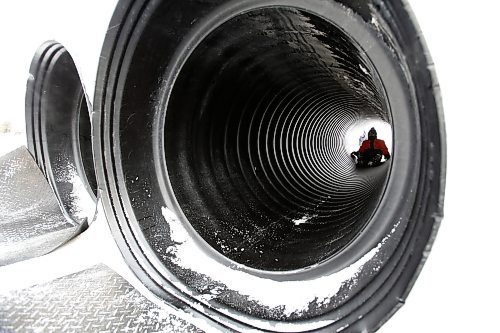 JOHN WOODS / WINNIPEG FREE PRESS
Children slide down a tube at the Festival du Voyageur, Monday, February 21, 2022. weekend.

Re: standup