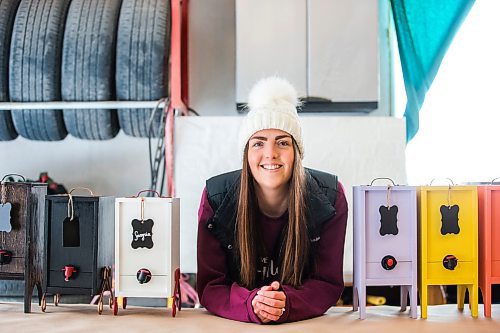 MIKAELA MACKENZIE / WINNIPEG FREE PRESS

Carmen Konzelman, founder of Uncorked Designs, poses for a portrait with her wine cabinets in Narol on Monday, Feb. 21, 2022. For Dave Sanderson story.
Winnipeg Free Press 2022.