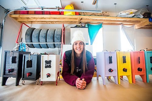 MIKAELA MACKENZIE / WINNIPEG FREE PRESS

Carmen Konzelman, founder of Uncorked Designs, poses for a portrait with her wine cabinets in Narol on Monday, Feb. 21, 2022. For Dave Sanderson story.
Winnipeg Free Press 2022.