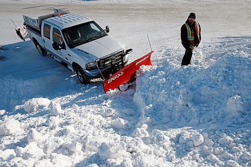 JOHN WOODS / WINNIPEG FREE PRESS
Troy Schmid, owner of The Sodfather Lawn Care and Snow Clearing, is photographed with his truck plow, Tuesday, February 22, 2022. Schmid has been busy this year.

Re: Abas