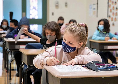 JESSICA LEE/WINNIPEG FREE PRESS



Students sit in class on the first day of school at Glenelm Community School on September 8, 2021.



Reporter: Maggie