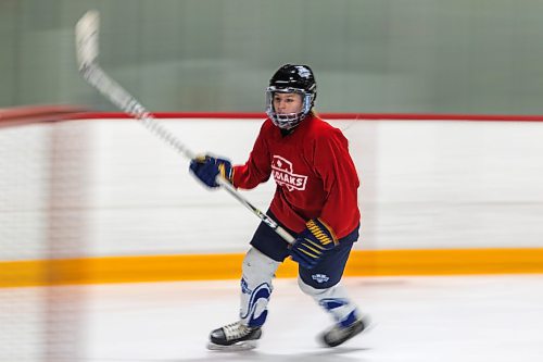 Daniel Crump / Winnipeg Free Press. River East Kodiak&#x573; Kaitlynn Anderson practices with her team Gateway arena. Anderson currently leads the WWHSHL in scoring and is heading to Umass Lowell next year to play lacrosse. February 23, 2022.