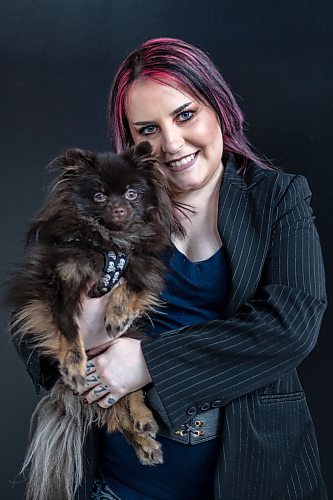 Daniel Crump / Winnipeg Free Press. Nikki Carruthers, co-owner of Neon Dragon, with her dog Viper. Neon Dragon is a luxury pet studio opening this spring. February 23, 2022.