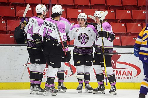 23022022
Brandon Wheat Kings players celebrate a goal during WHL action against the Saskatoon Blades at Westoba Place on Wednesday evening. (Tim Smith/The Brandon Sun)