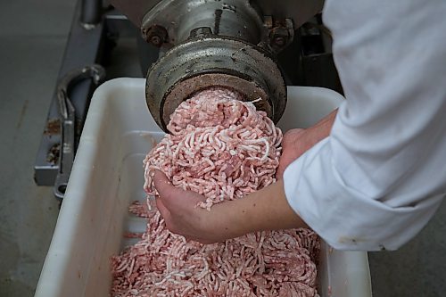 JESSICA LEE / WINNIPEG FREE PRESS
Michelle Mansell, owner, grinds pork at Frig’s Natural Meats on February 22, 2022.
Reporter: Dave