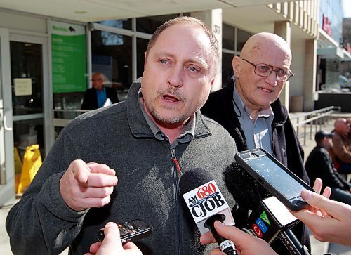 BORIS MINKEVICH / WINNIPEG FREE PRESS

A guilty verdict was handed down to James Aisaican-Chase, right, at courts this morning (373 Broadway). Red light camera case. Todd Dube, founder of Wise Up Winnipeg, left, talks to the media shortly after the ruling. RYAN THORPE STORY.  May 4, 2018